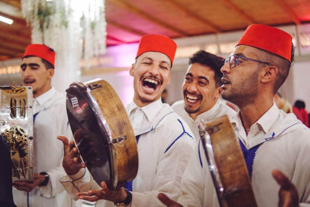 Moroccan wedding, personal driver and Def player laughing